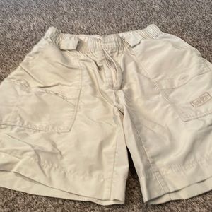 Mens AFTCO shorts size 34 light stone color. Used  condition.